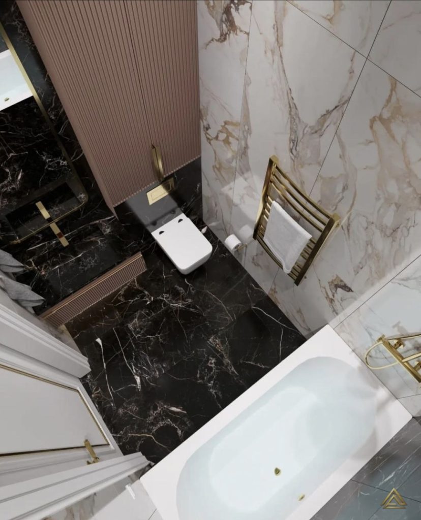 Projet de rénovation de salle de bain (marbre noir et blanc, finitions dorées et paroi rose), réalisé par PRO BAT-IM, à Val-de-Marne.