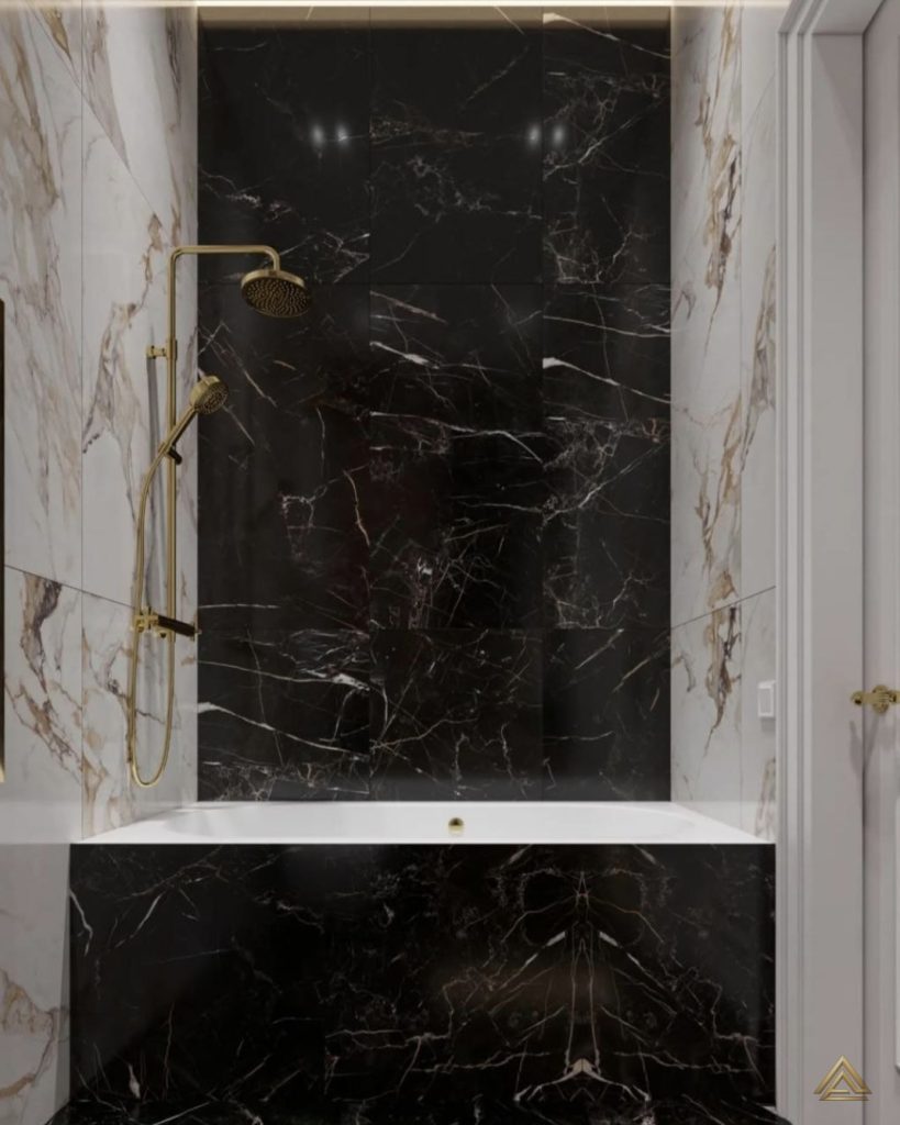 Projet de rénovation de salle de bain (douche en marbre noir et blanc, robinetterie dorée), réalisé par PRO BAT-IM, à Val-de-Marne.