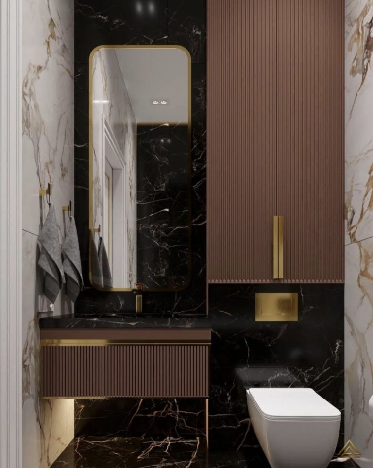 Projet de rénovation de salle de bain (marbre noir et blanc, finitions dorées et panneau mural texturé), réalisé par PRO BAT-IM, à Val-de-Marne.