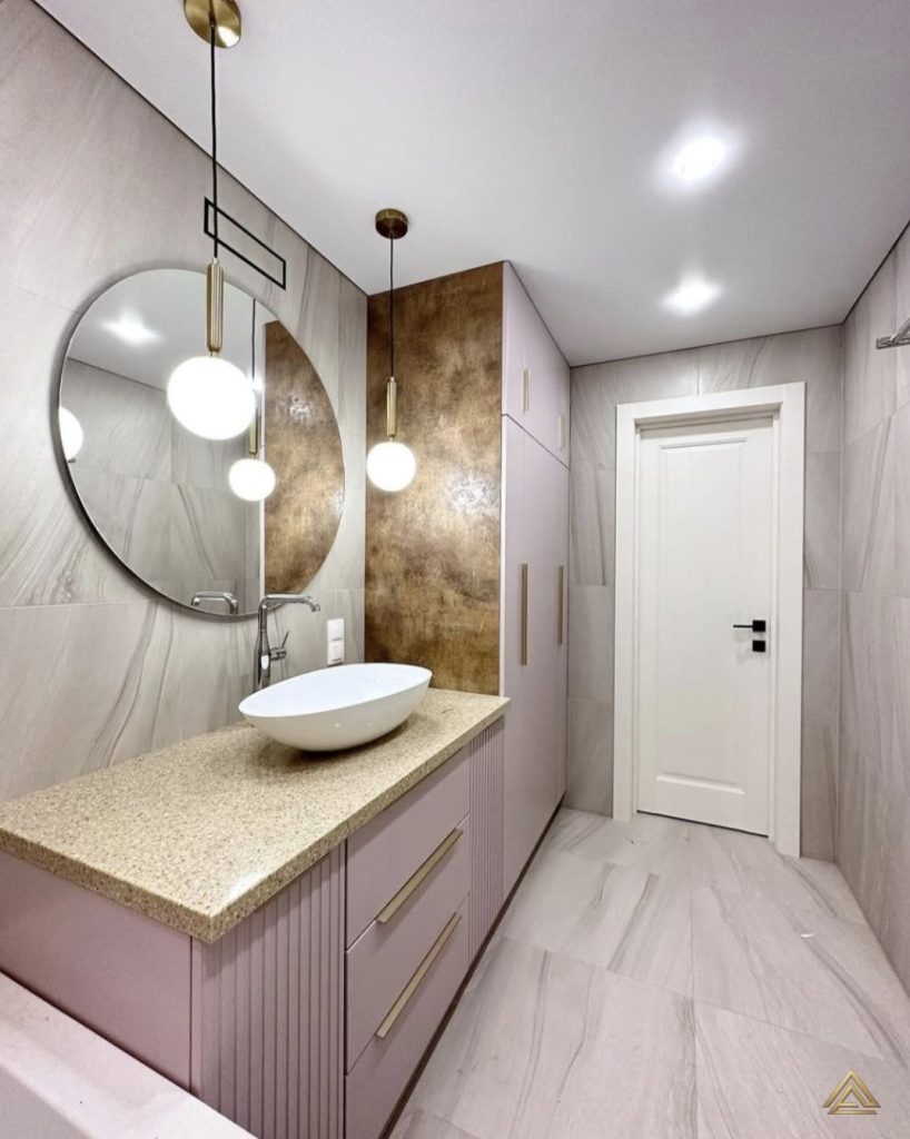 Projet de rénovation de salle de bain (mobilier rose poudré, vasque bol et plan en terrazzo), réalisé par PRO BAT-IM, à Val-de-Marne.